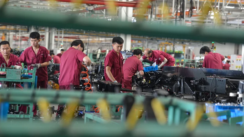 Fotografija: Za Peking je izjemno pomembno, da je Kitajska postala prvo veliko gospodarstvo, ki mu je uspelo povrniti rast še za časa pandemije. Foto Str/AFP