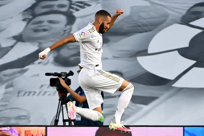 Karim Benzema ima za seboj odlično sezono in je še v igri za strelsko lovoriko. FOTO: Gabriel Bouys/AFP