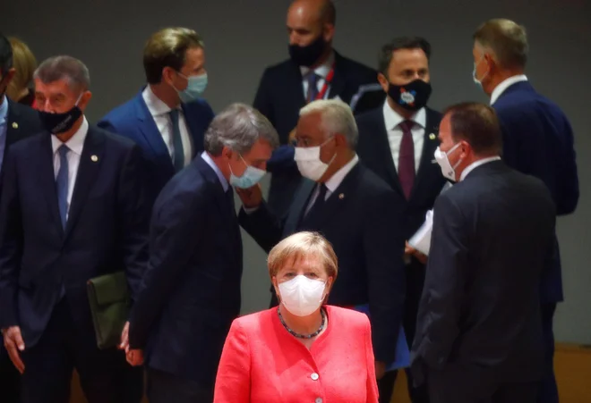 Angela Merkel, kanclerka gospodarsko najmočnejše članice EU, je ob začetku vrha prejemala čestitke za 66. rojstni dan.&nbsp;Foto: Francois Lenoir/Reuters