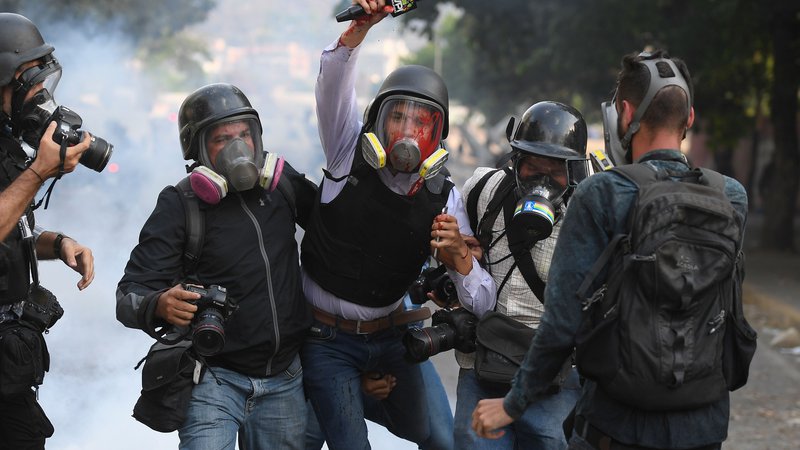 Fotografija: Nemiri v Venezueli so se razplamteli. FOTO: Federico Parra/Afp