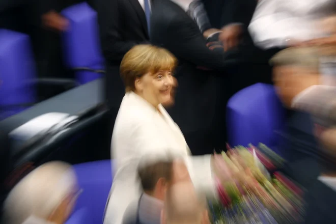 Merklova naj bi vedela za številne nepravilnosti. FOTO: Kai Pfaffenbach/Reuters