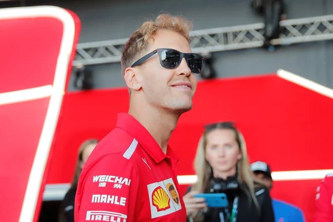 Sebastian Vettel ohranja upanje na srečen zasuk v boju za peti naslov. FOTO: Reuters