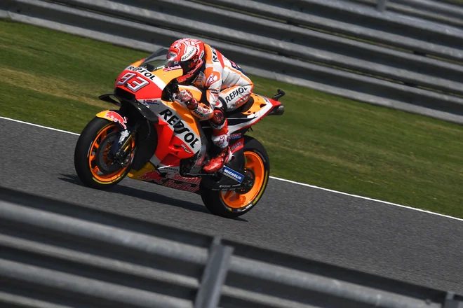 Marc Marquez je bil za las najhitrejši. FOTO: Lillian Suwanrumpha/AFP