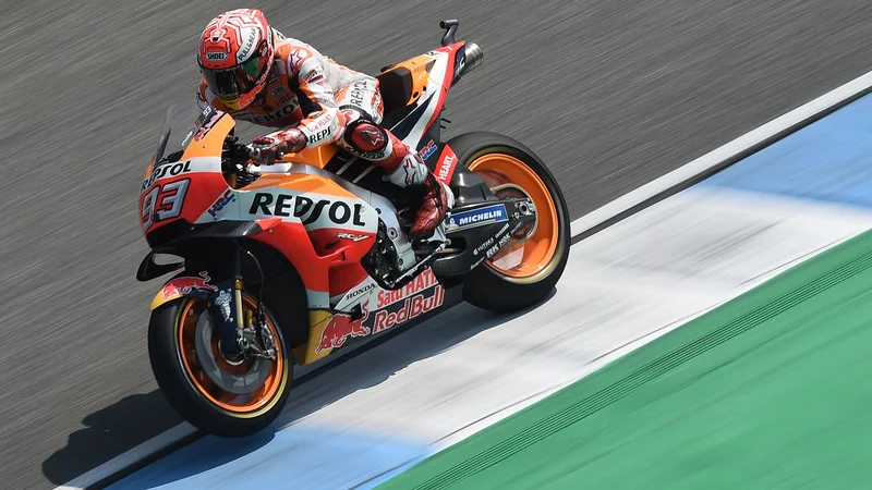 Fotografija: Marc Marquez je bil v zaključnih medrih najbolj drzen. FOTO: Lillian Suwanrumpha/AFP