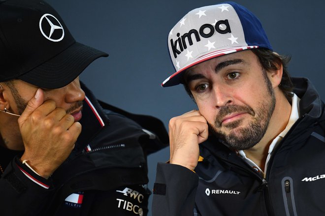 Fernando Alonso meni, da je Lewis Hamilton že eden največjih dirkačev vseh časov. FOTO: AFP