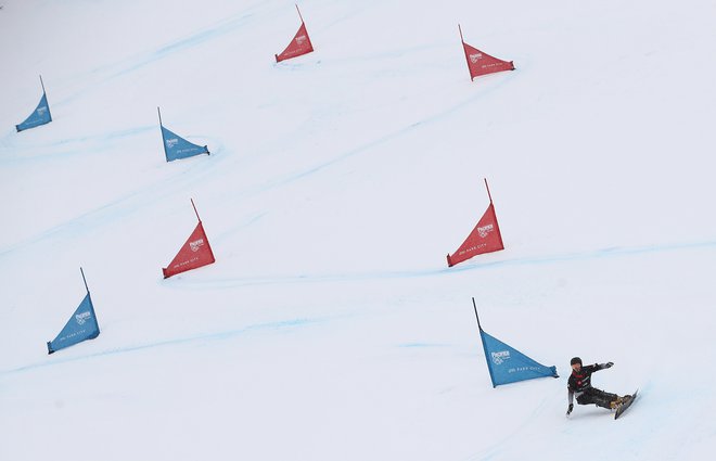 Po Timovem finalnem padcu je Dmitrij Loginov mirno oddeskal do cilja. FOTO: Ezra Shaw/AFP