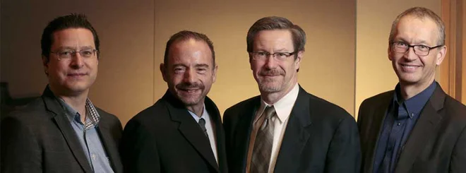 Timothy Ray Brown (drugi z leve), poleg sta še Keith Jerome in Hans-Peter Kiem, raziskovalca iz centra Fred Hutch. FOTO: Robert Hood/Fred Hutch News Services