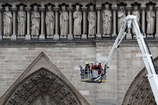 Vsakdo, ki je bil kdaj v Parizu, ima svojo zgodbo z Notredamsko katedralo. Foto: AFP