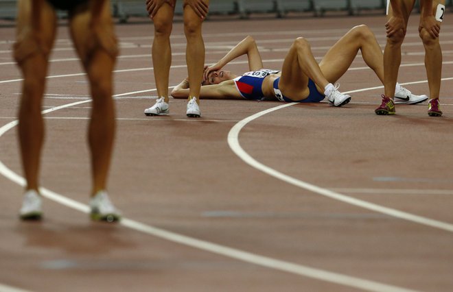 Osemstometrašice po polfinalu na svetovnem prvenstvu v Pekingu. Hutchinson priznava, da je bila ta disciplina zanj najbolj boleča. Foto Reuters