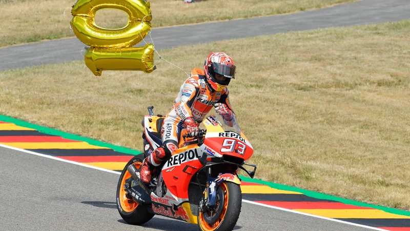 Fotografija: Marc Marquez je proslavil jubilejno deseto zmago v Nemčiji že na progi. FOTO: AFP