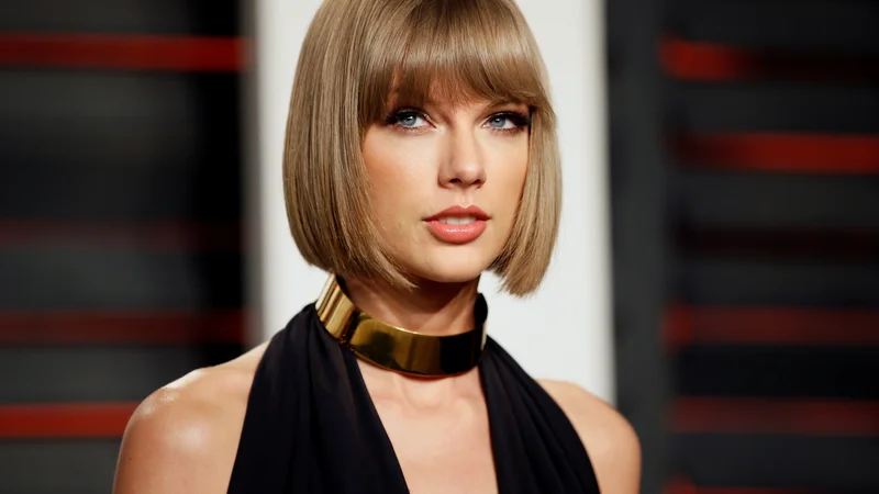 Fotografija: Taylor Swift je od lanskega junija zaslužila 185 milijonov ameriških dolarjev (okoli 164 milijonov evrov), kar je največ doslej. FOTO: Danny Moloshok/Reuters