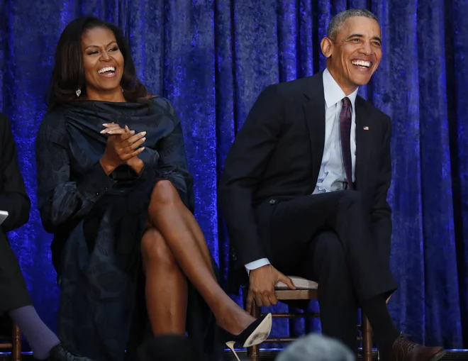 Zakonca Obama sta občudovana širom po svetu. FOTO: Jim Bourg/Reuters