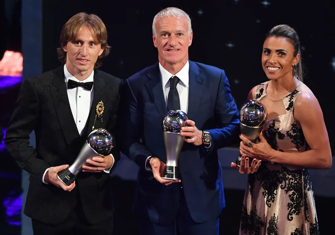 Lanski dobitniki nagrad: Luka Modrić, Didier Deschamps in Marta. FOTO: AFP