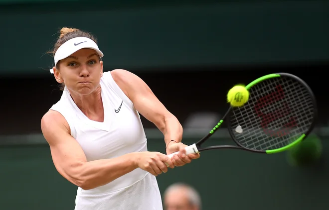 Simona Halep se je v Wimbledonu razveslila največje lovorike in bo lahko zdaj bolj sproščeno igrala na velikih slamih. Foto AFP