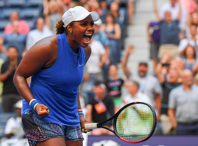 Ameriška kvalifikantka Taylor Townsend je presenetila wimbledonsko zmagovalko Simono Halep. FOTO: USA TODAY Sports