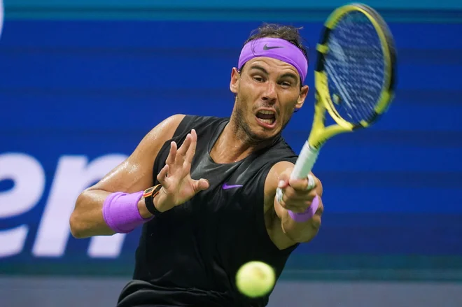 Rafael Nadal je brez težav ugnal Marina Čilića. FOTO: AFP