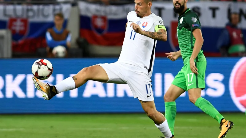 Fotografija: Marek Hamšik je tudi po odhodu na Kitajsko še vedno najprepoznavnejši simbol slovaškega nogometa.
FOTO: Reuters