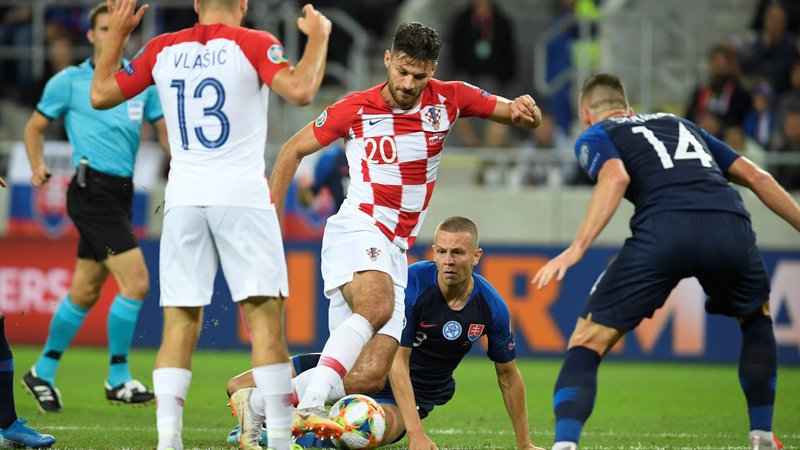 Fotografija: Ko je bilo treba, je Hrvaška uprizorila vrhunsko predstavo in v gosteh na Slovaškem dosegla najvišjo zmago v teh kvalifikacijah. Eden od junakov je bil Dinamov napadalec Bruno Petković. FOTO: Reuters