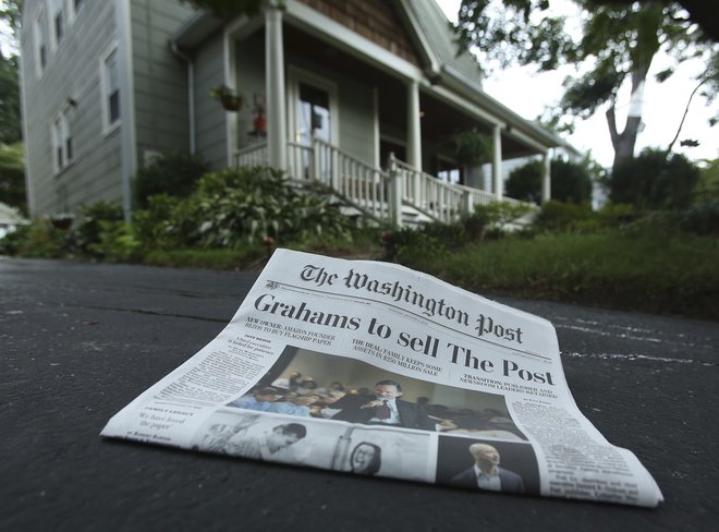 Demokracija umre v temi je nov slogan Washington Posta. FOTO: Gary Cameron/Reuters