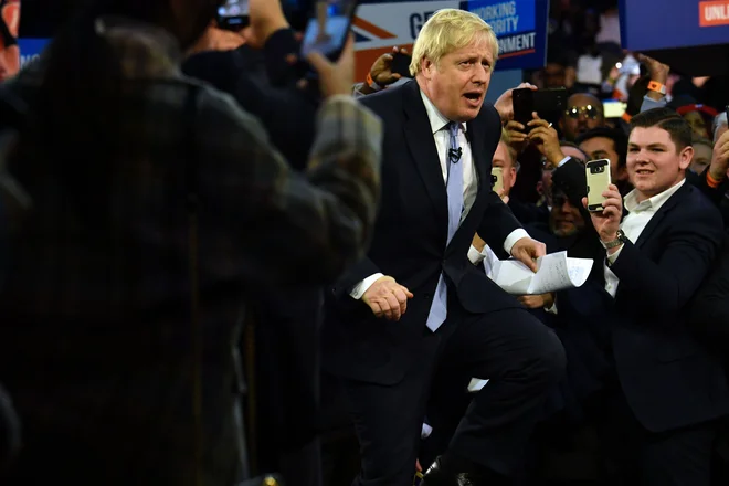 Boris Johnson na predvečer volitev. FOTO: Ben Stansall/AFP