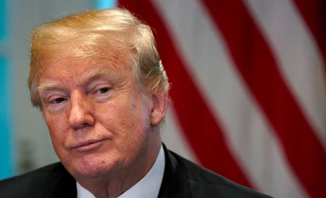 Trumpovo finančno poročilo tudi letos sproža številna etična vprašanja. FOTO: Kevin Lamarque/Reuters