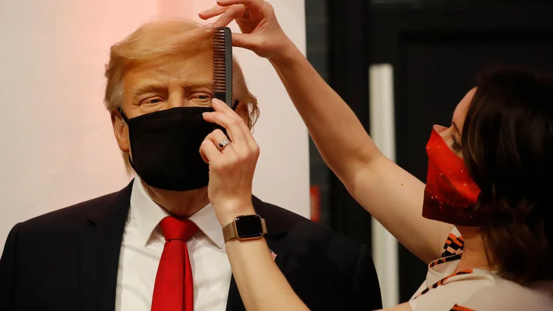 Fotografija: Zadnje urejanje voščene lutke Donalda Trumpa v muzeju Madame Tussaud. FOTO: Tolga Akmen/AFP