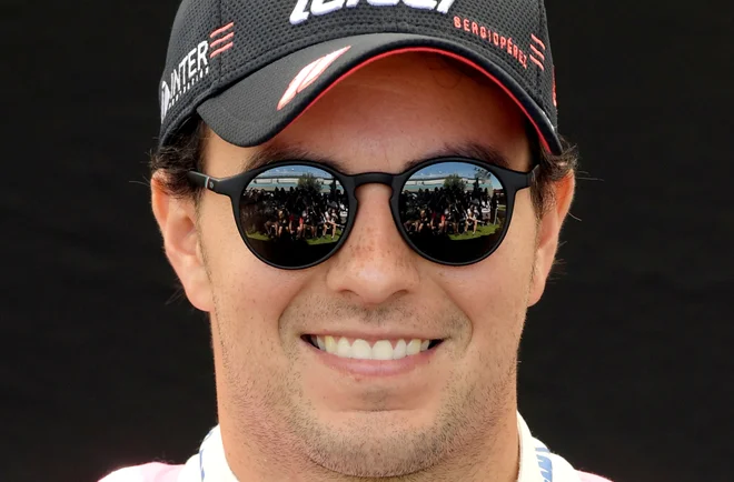 Sergio Perez se je znašel v veliki negotovosti pred nedeljsko dirko v Silverstonu. FOTO: Tracey Nearmy/Reuters