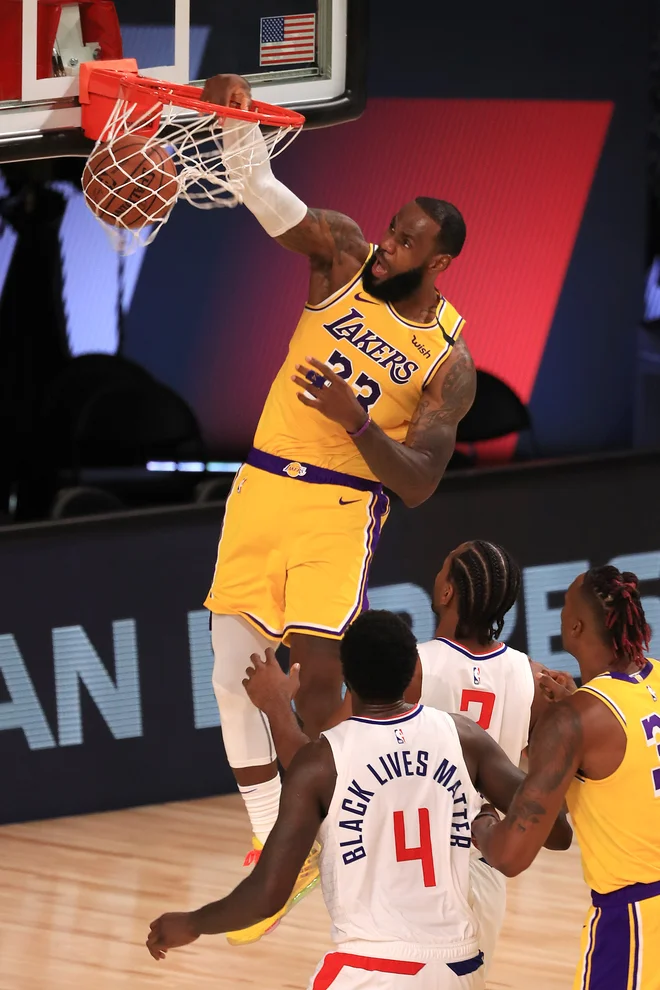 LeBron James je bil med junaki uvodnega večera nadaljevanja v ligi NBA. FOTO: Mike Ehrmann/USA Today Sports