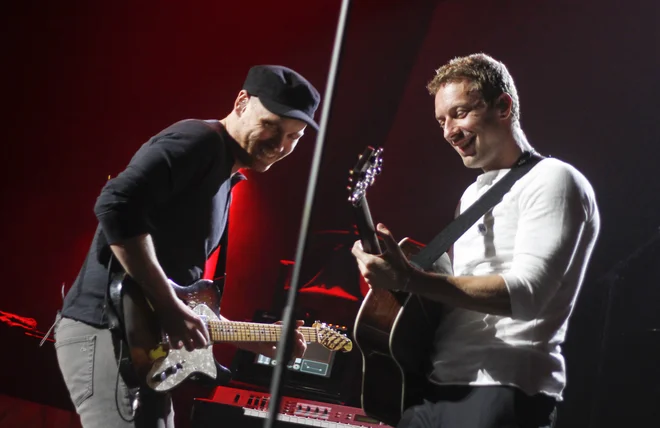 Skupina Coldplay je z dvoletno turnejo zaslužila dovolj, da so se uvrstili na sedmo mesto . FOTO: AP/Jack Plunkett
