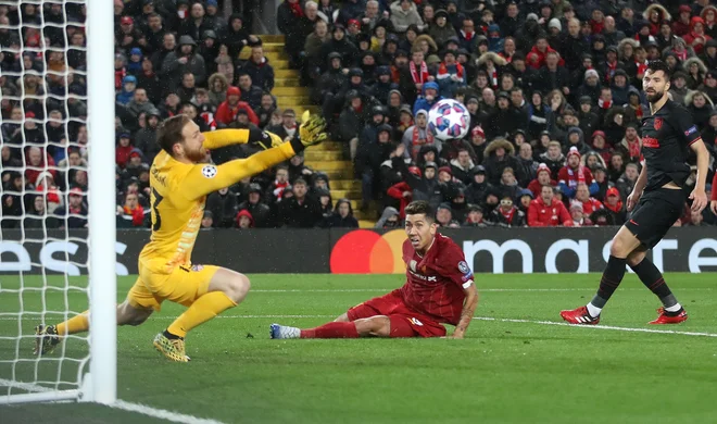 Jan Oblak je 11. marca z bravuroznimi obrambami Liverpoolu preprečil ubranitev naslova. FOTO: Carl Recine/Reuters