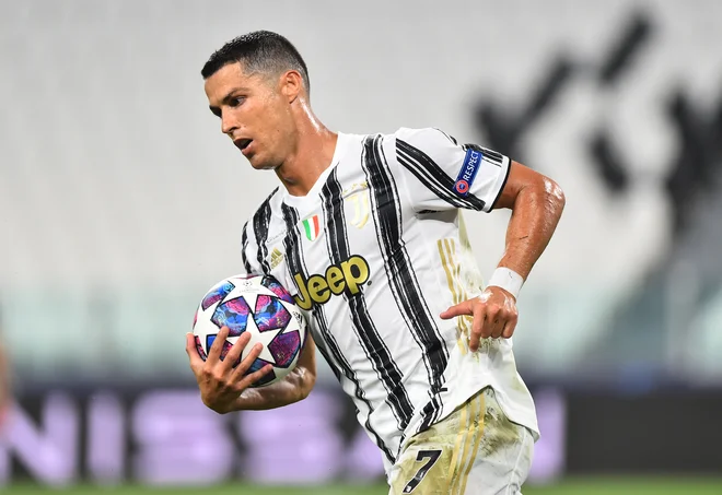 Cristiano Ronaldo je zabil dva gola za Juventus, a v četrtfinale gre Lyon. FOTO: Massimo Pinca/Reuters