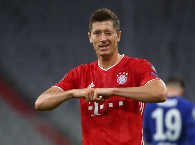 Robert Lewandowski je imenitno formo potrdil tudi proti Chelseaju. FOTO: Michael Dalder/Reuters
