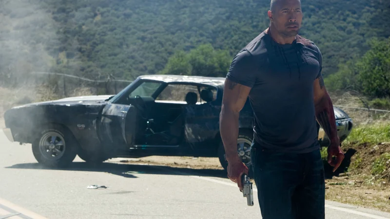 Fotografija: V letnem zaslužku Dwayna Johnsona največ, kar 23,5 milijona dolarjev, predstavlja honorar za vlogo v Netflixovem trilerju Red Notice. FOTO: Promocijsko gradivo