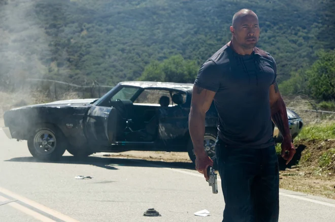 V letnem zaslužku Dwayna Johnsona največ, kar&nbsp;23,5 milijona dolarjev, predstavlja honorar za vlogo v&nbsp;Netflixovem trilerju&nbsp;<em>Red Notice. </em>FOTO: Promocijsko gradivo