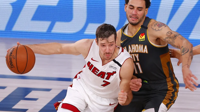 Fotografija: Goran Dragić je bil vnovič med najbolj vidnimi pri moštvu Miamija. FOTO: Kevin C. Cox/AFP