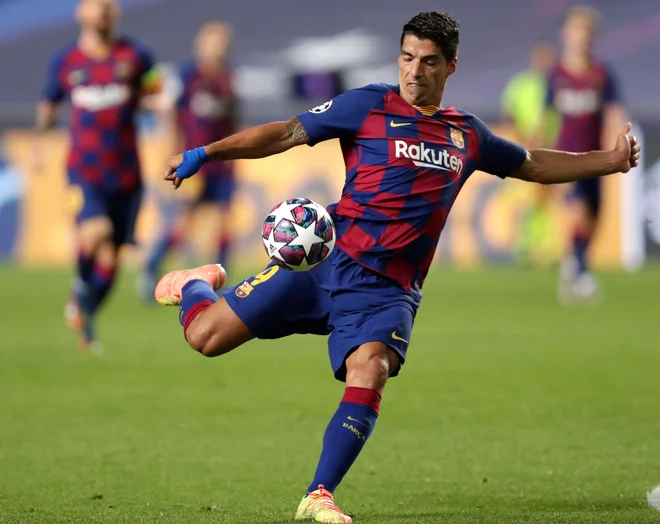 Kanček upanja je Barceloni z golom v 64. minuti vlil Luis Suarez. FOTO: Manu Fernandez/AFP