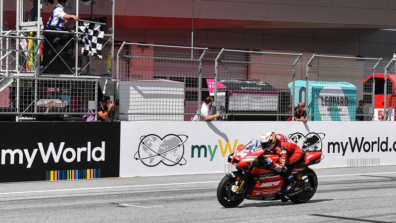 Fotografija: Andrea Dovizioso je na Spielbergu dosegel svojo prvo zmago sezone. FOTO: Joe Klamar/AFP