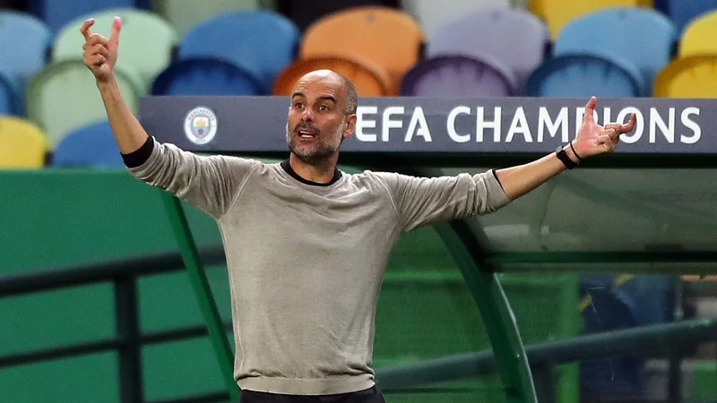 Fotografija: Pep Guardiola je že tretjič zapored izgubil proti slabše rangiranemu moštvu. FOTO: Miguel A. Lopes/AFP