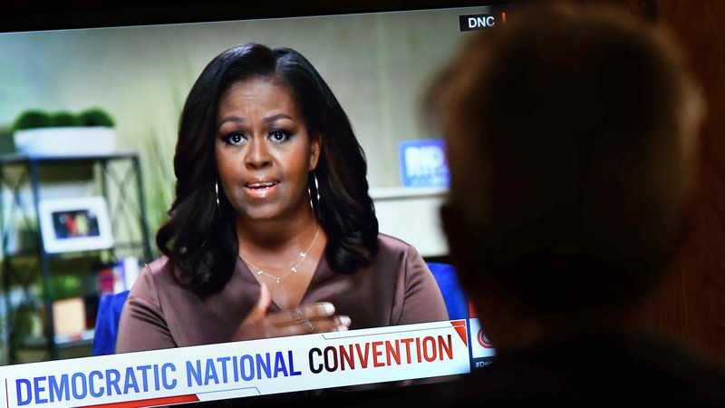 Fotografija: Michelle Obama je v govoru pozvala ljudi, naj na prihodnjih ameriških predsedniških volitvah volijo, kot da jim gre za življenje. FOTO: Chris Delmas/AFP