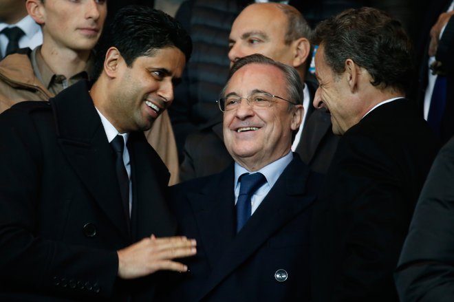 Nasser Al-Khelaifi (levo) je še bolj motiviran po porazu Paris St. Germaina v finalu lige prvakov in se bržkone ne bi branil Messijevega prihoda. FOTO: Charles Platiau/Reuters