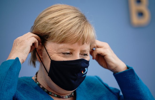 Angela Merkel je sodržavljane še včeraj znova pozvala k zaščitnim ukrepom proiti virusu. FOTO: Michael Kappeler/AFP