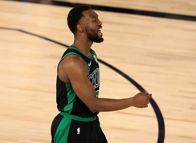 Kemba Walker je dosegel zadnji točki za Boston. FOTO: Mike Ehrmann/AFP