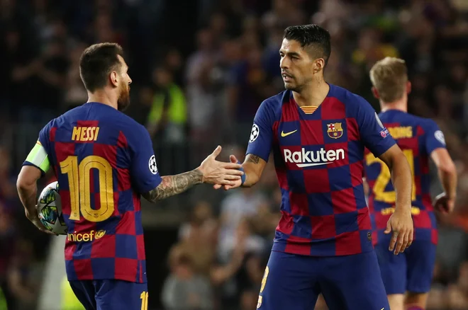 Luis Suarez (desno) je v Barceloni odlično sodeloval z Lionelom Messijem. FOTO: Sergio Perez/Reuters