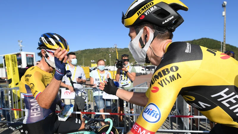 Če ne zmaga Primož Roglič (levo), zmaga Wout van Aert. FOTO: Stephane Mantey/AFP