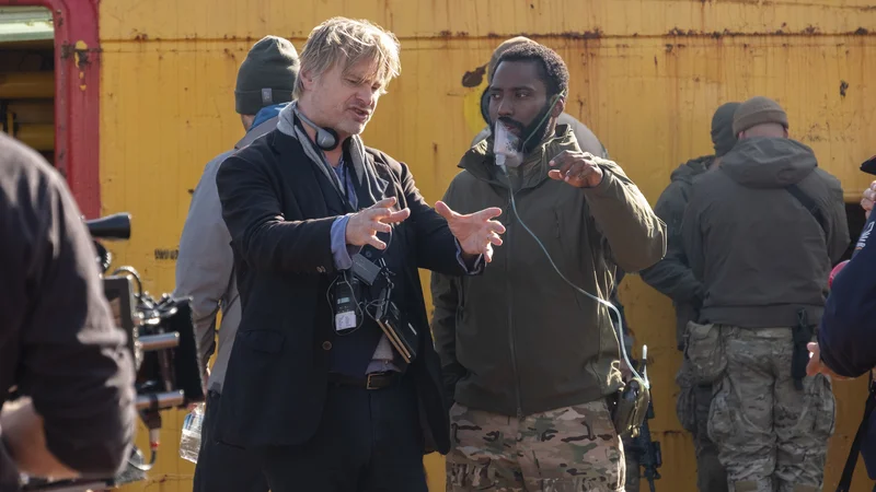Fotografija: Christopher Nolan daje napotke Johnu Davidu Washingtonu. FOTO: arhiv studia