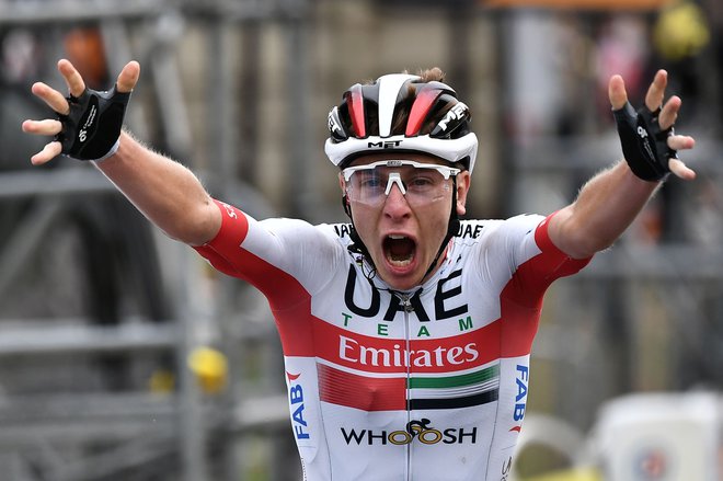 Pogačar, zmagovalec 9. etape, svoje prve na Touru. FOTO: Marco Bertorello/AFP