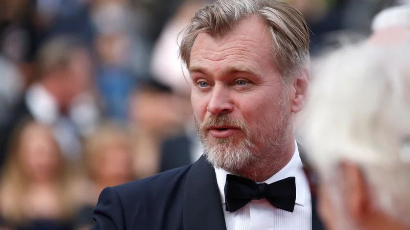 Fotografija: Režiser Christopher Nolan se je s časom v svojih filmih poigral že večkrat. FOTO: Stephane Mahe/Reuters