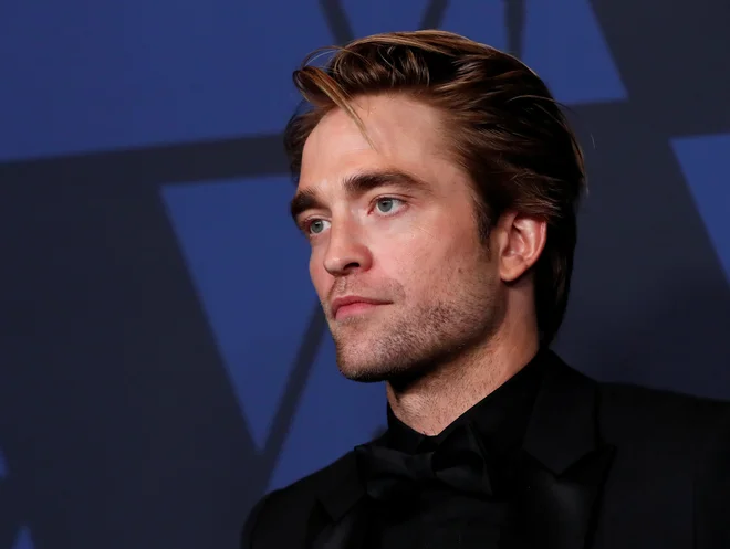 Snemanje najnovejšega Batmana so ustavili, ker se je okužil glavni igralec Robert Pattinson. FOTO: Mario Anzuoni/Reuters