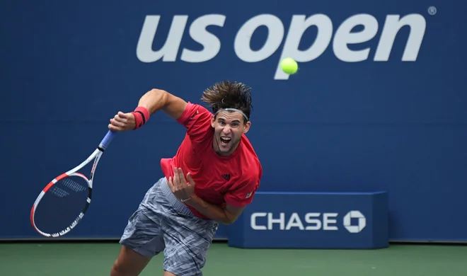 Avstrijec Dominic Thiem je imel proti maldemu Kanadčanu Felixu Auger-Aliassimeauju težave le v prvem nizu, potem je prvi favorit za končno zmago na OP ZDA dvignilr aven igre. FOTO: Danielle Parhizkaran/USA TODAY Sports