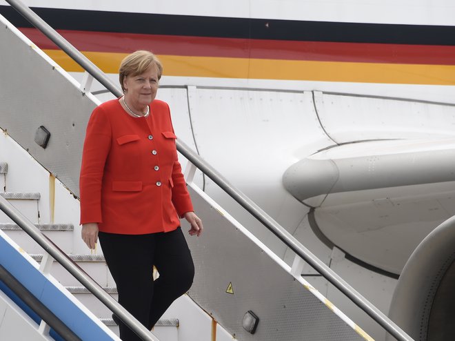 Angela Merkel: Seveda ima vsakdo svoje interese, v pogovorih pa smo doslej vedno našli za vse sprejemljive rešitve. FOTO: AFP